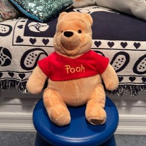 Who does Not love Pooh?  Like new condition Official Disney Store Pooh
